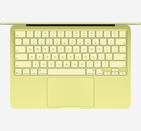 Вид сверху, показывающий клавиатуру MacBook Neo A18 Pro Цитрусовый